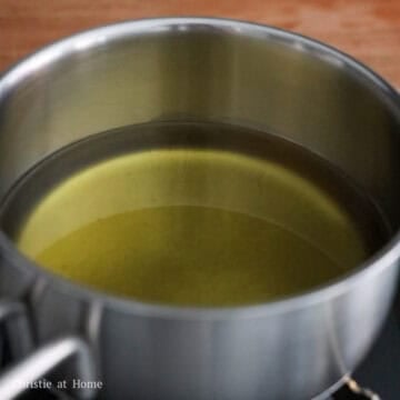 Heat vegetable oil until hot in a small pot.