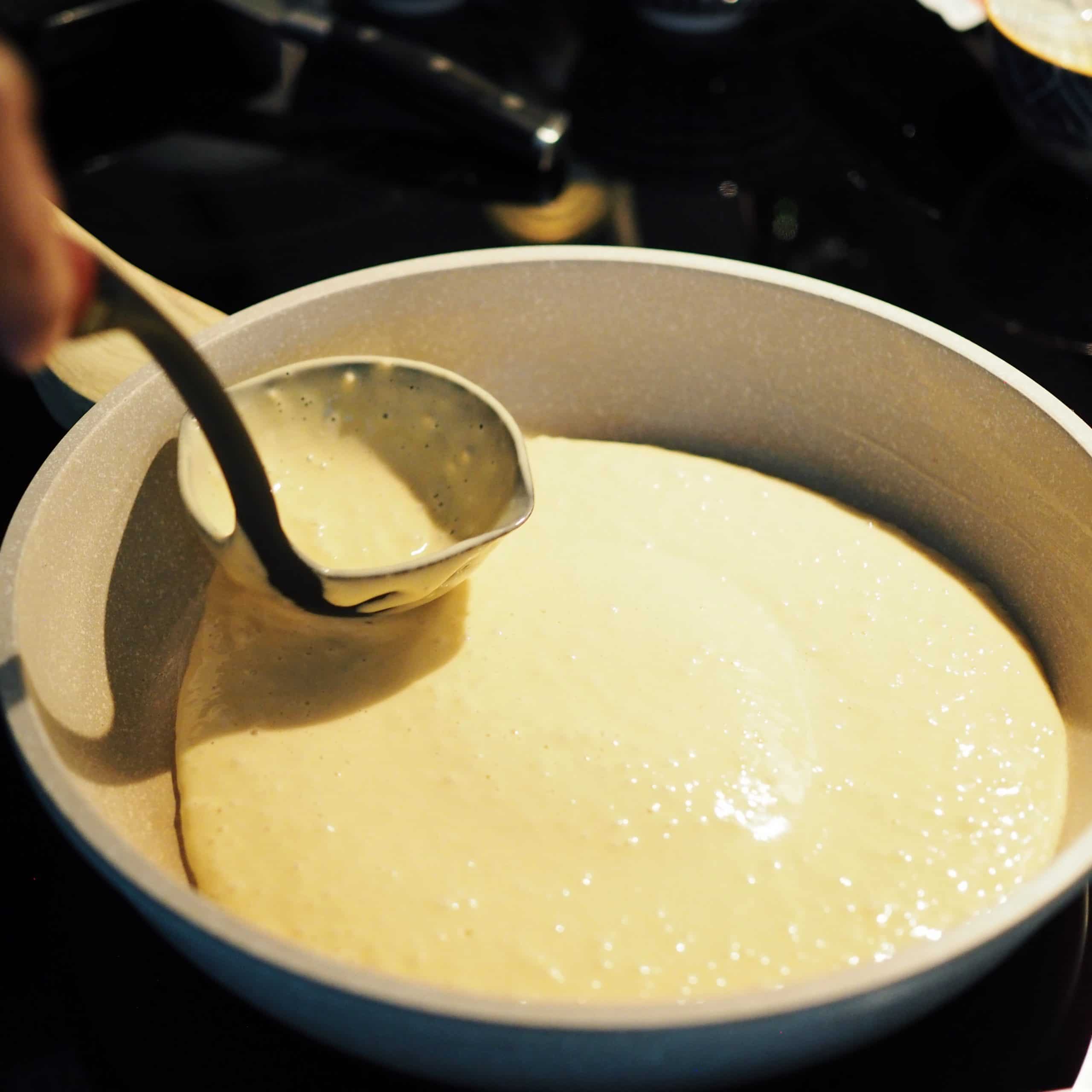 ladle batter into pan