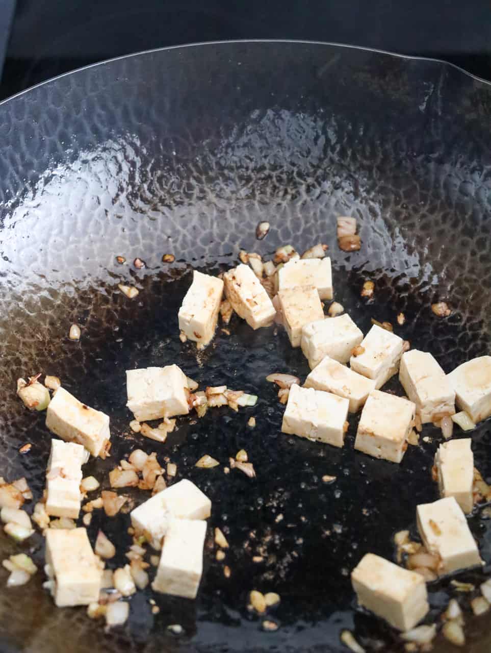 fry aromatics and tofu