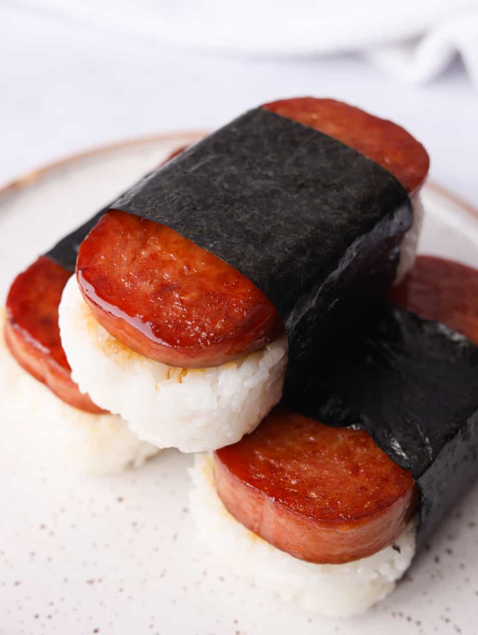 Christie Lai on Instagram: Teriyaki Spam Musubi [visit profile for recipe  link]. Pan-fried spam with a homemade teriyaki glaze packed with sushi rice  and wrapped in roasted seaweed. A delicious Hawaiian Japanese