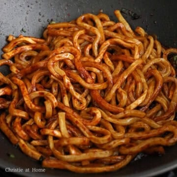 Toss in udon noodles and mix well until noodles are coated in sauce.