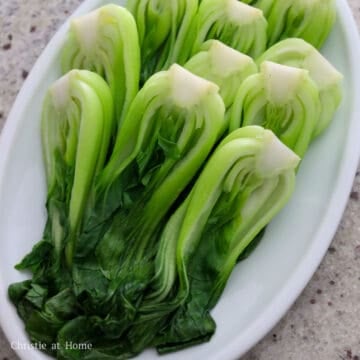 Transfer the bok choy to a large serving plate. 