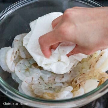 Transfer the shrimp to a large bowl and pat dry with clean paper towel to remove any excess moisture. 