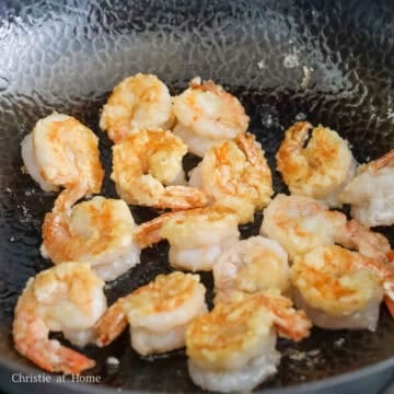 Heat 3 tablespoon or 45 ml vegetable oil in a large pan on medium heat. Fry the coated shrimp on both sides just until pink, curled, and crispy, about 3-4 minutes. Do not overcook. Remove shrimp from the pan. 