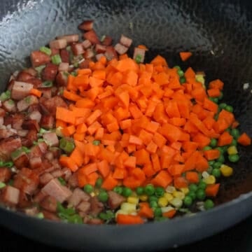 fry vegetables and green onions and garlic