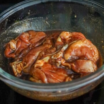 Transfer chicken thighs into a large bowl. Add marinade ingredients into the bowl and massage into chicken until coated. Marinate for 15 minutes or overnight in the fridge. 