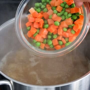 Add frozen mixed vegetables and boil for 30 seconds or until vegetables float to the top. Once boiled, remove the pot off heat and cover to keep hot.