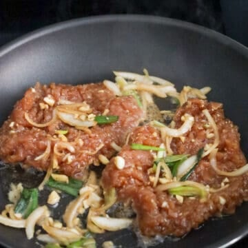 Heat vegetable oil in a large non-stick pan on medium heat. Fry pork chops in small batches with some of the marinade and do not over crowd the pan. 