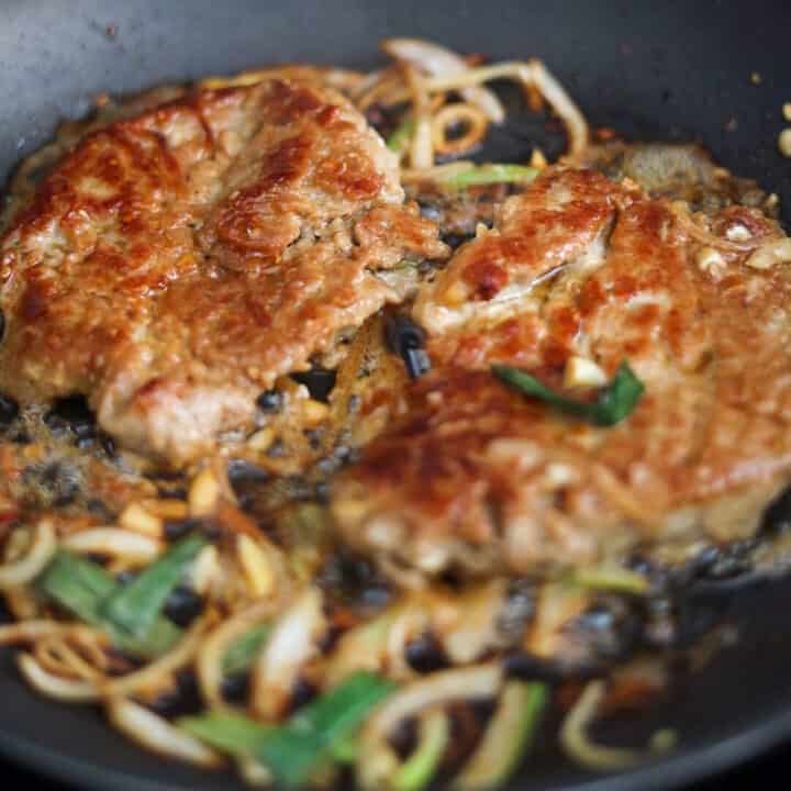 Korean-style pork chops cooked until lightly caramelized and juicy.