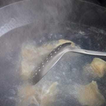 Pork and shrimp wontons boiled until floating and cooked through.