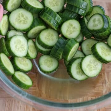Let cucumbers sit for 20 minutes in the salt to draw out excess water to make them crunchier. 