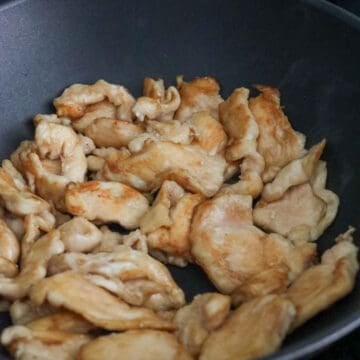 fry chicken until cooked and remove from pan