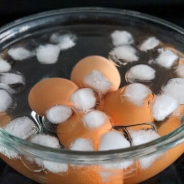 place boiled eggs in ice bath
