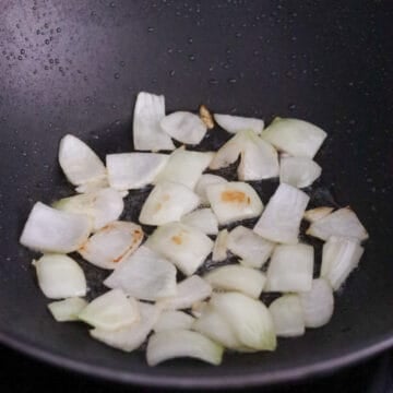 On medium high heat, fry onions until translucent, about 30-45 seconds.