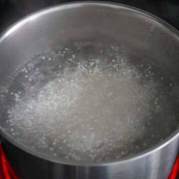 In a medium size pot of water (about 5 cups of water), bring to a boil on high heat. Once the hot water reaches boiling point, add tapioca pearls. Reduce to medium heat or to a rolling boil, boil for 10 minutes uncovered. Stir occasionally.