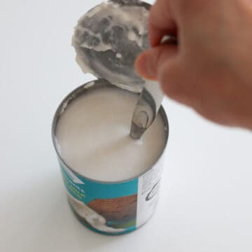 Open canned coconut milk with a can opener and give it a thorough mix inside the can so the fats combine with the coconut water.