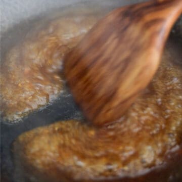 In the same pan set over medium high heat, pour sauce in. Stirring consistently until the sauce bubbles and thickens, about 2-3 minutes.
