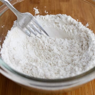 ​Prepare the dredging stations by mixing flour mixture ingredients (as listed above) in a medium sized bowl. Then in a small bowl, crack and beat an egg. Lastly on a baking sheet or large shallow dish, spread panko breadcrumbs in a single layer.