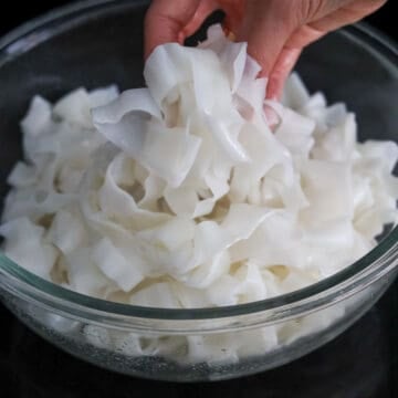 If needed, microwave fresh rice noodles for 2-3 times at 60 second intervals until soft and pliable. Gently separate them by hand after they've cooled down a bit.