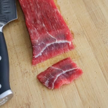 Slice beef on a bias into ¼-inch thick pieces