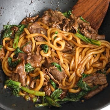 Toss in the beef and stir fry for another minute until beef is cooked through. Serve and enjoy! 