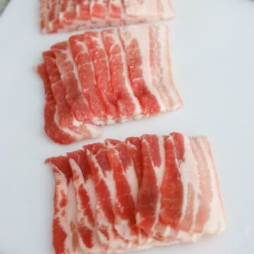 Slice pork belly strips into 2.5 - 3 inch long pieces.