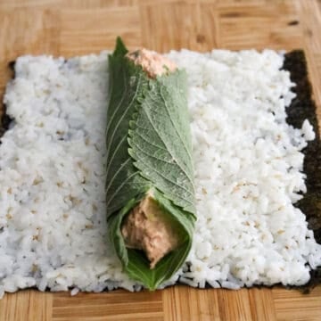 Fold the perilla leaves over the tuna mixture, to hold the tuna mixture in.  