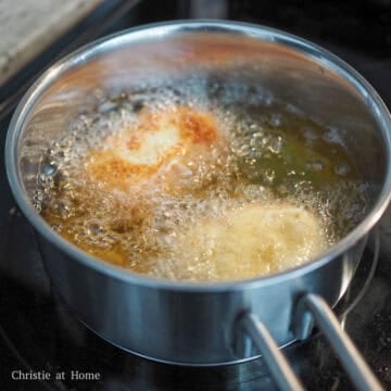 heat 2 cups of vegetable oil on medium heat and deep fry until golden or for 3 minutes