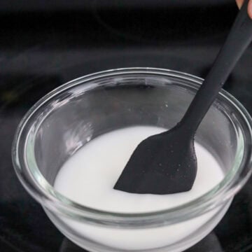 Combine 1 tablespoon cornstarch and ½ cup water until the starch has dissolved