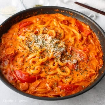 featured image of creamy rose bacon udon