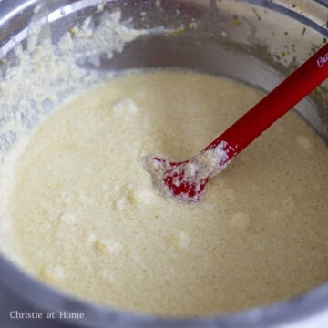 With a spatula, gently fold ⅓ of the egg whites into the batter at a time until incorporated. The batter will be very runny and lumpy, which is normal.