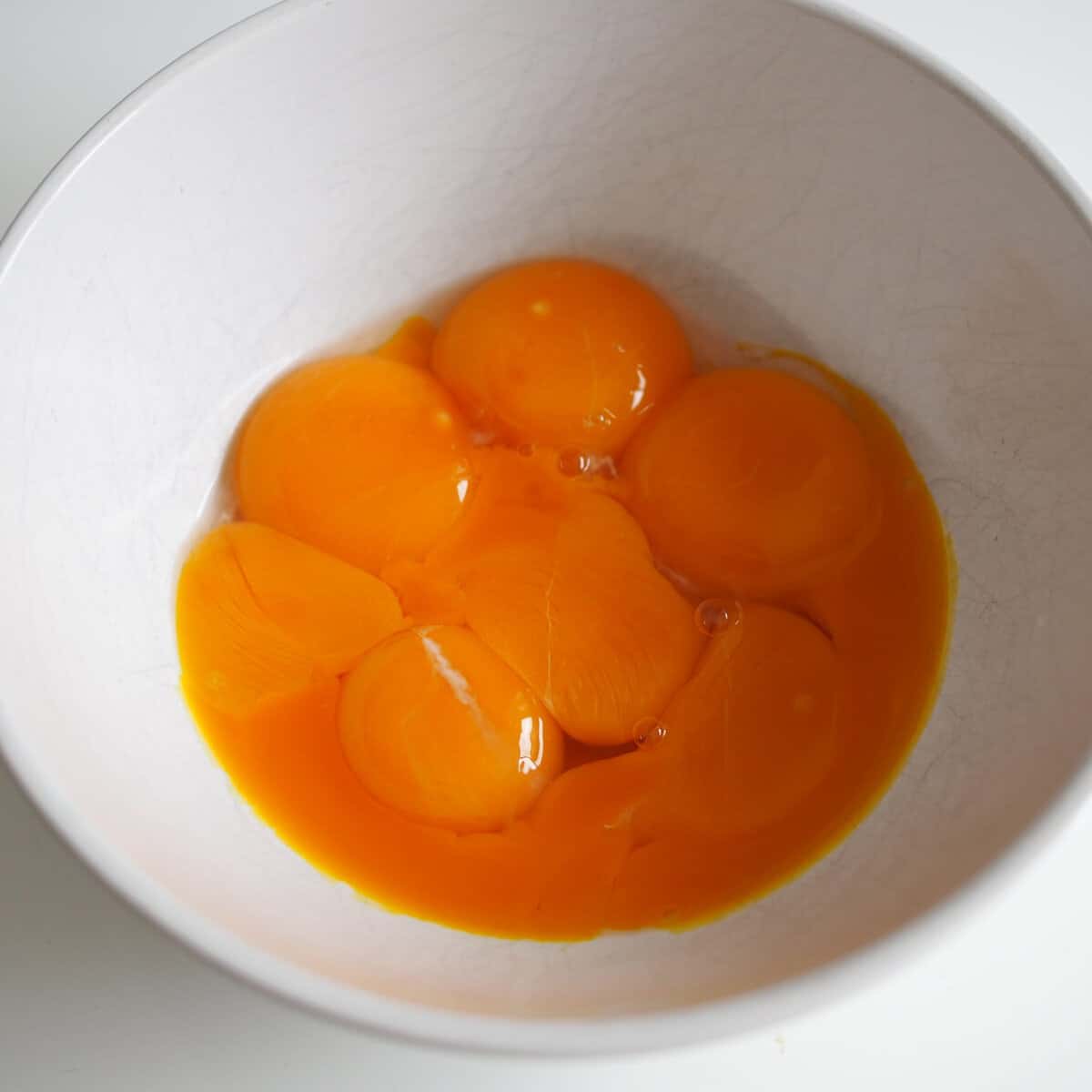 Separate egg yolks from whites