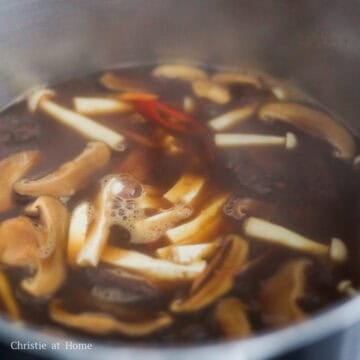 Add tofu and the cornstarch slurry to thicken the soup.