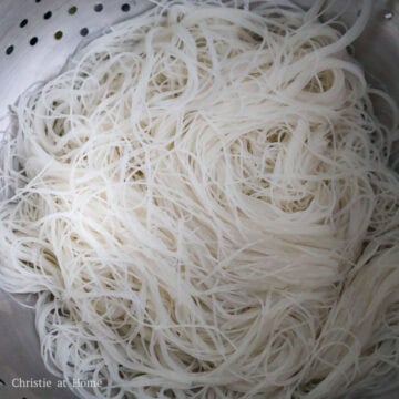 In a large bowl, soak vermicelli rice noodles in hot boiling water for 1-2 minutes max until noodles are loosened, limp and slightly softened. Strain immediately and rinse under cold water to remove excess water. Shake out any excess liquids. 