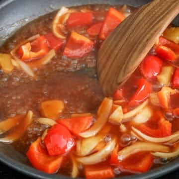 Sauté vegetables and thicken sauce: