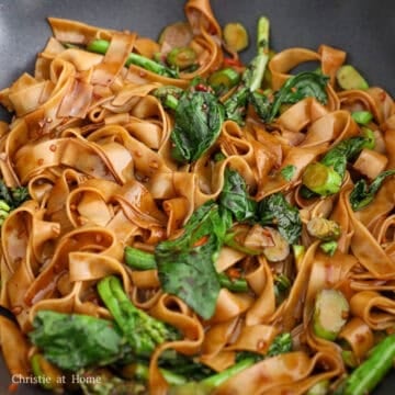 Add in fresh rice noodles and noodle sauce. Gently toss until evenly coated and most of the sauce has absorbed into the noodles. Let noodles sit and char in the pan for 30-60 seconds for extra flavor.