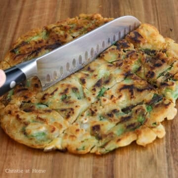 Slice the pancake into smaller pieces.