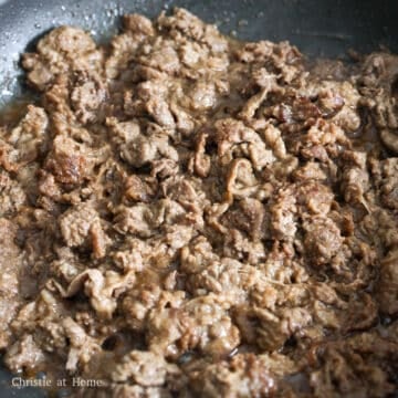 fry beef in small batches shaking off any excess marinade