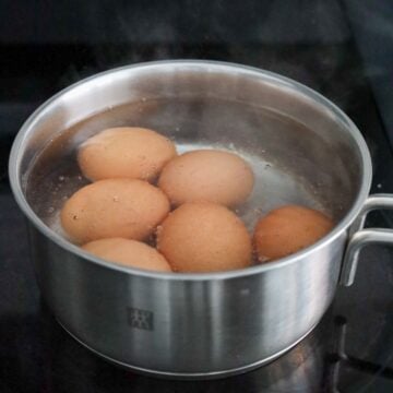 boil eggs for 13 minutes on medium-high heat uncovered
