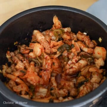 Add kimchi and cook until kimchi juices release, about 1-2 minutes.