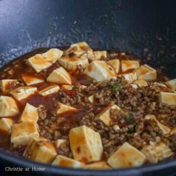 Add in diced tofu and gently toss with sauce using a silicone spatula by lifting from the bottom or giving the pan a wiggle. 