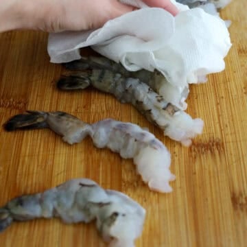 Pat dry the shrimp with paper towel to remove excess moisture. 