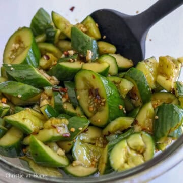 Season strained cucumbers with sauce ingredients and mix well. Enjoy!