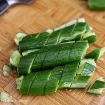 Slice cucumbers on an angle into 2-cm thick diagonal strips.