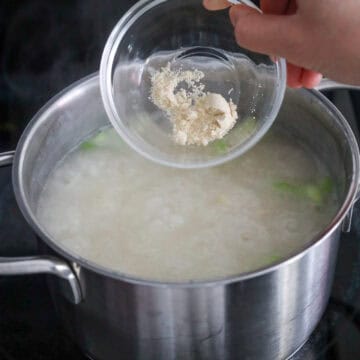 Season with salt and chicken powder. Remove off heat. If you like the congee less thick, mix in another ½ cup of water and season with more salt to taste if needed.