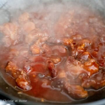 Once the sauce has thickened, toss in the fried pork until the pork is evenly coated in the sauce. 
