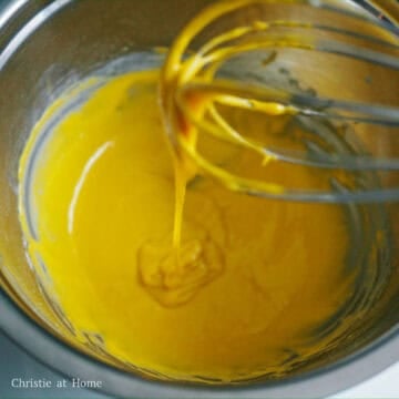 In a large mixing bowl, add egg yolks, milk, vegetable oil and vanilla extract. Whisk until foamy. Sift in cake flour and whisk until well combined but do not over mix. The batter should still be runny.