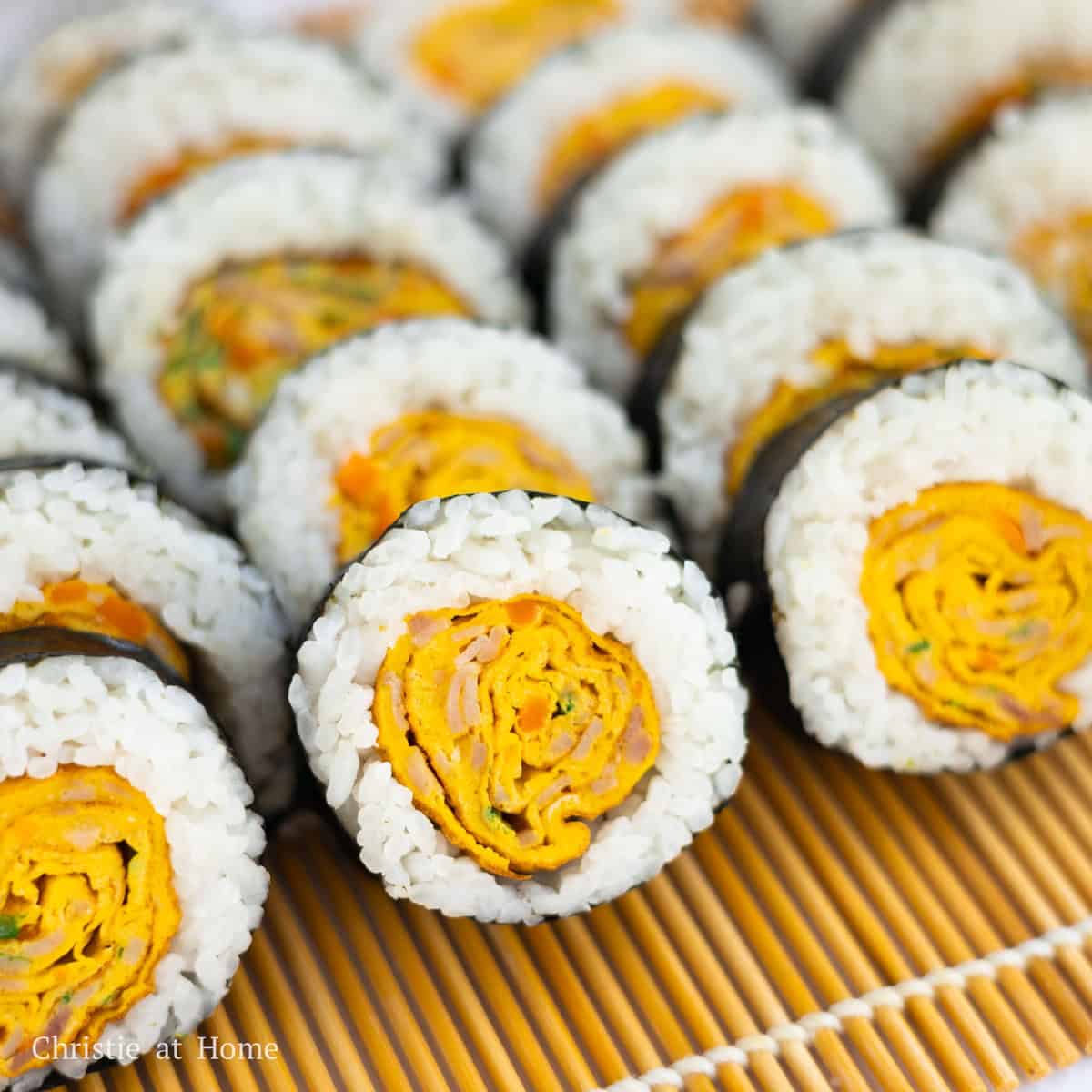 Slice each kimbap into 8 pieces that are ¾-inch wide. Repeat process for remaining rolls. Enjoy warm or at room temperature.
